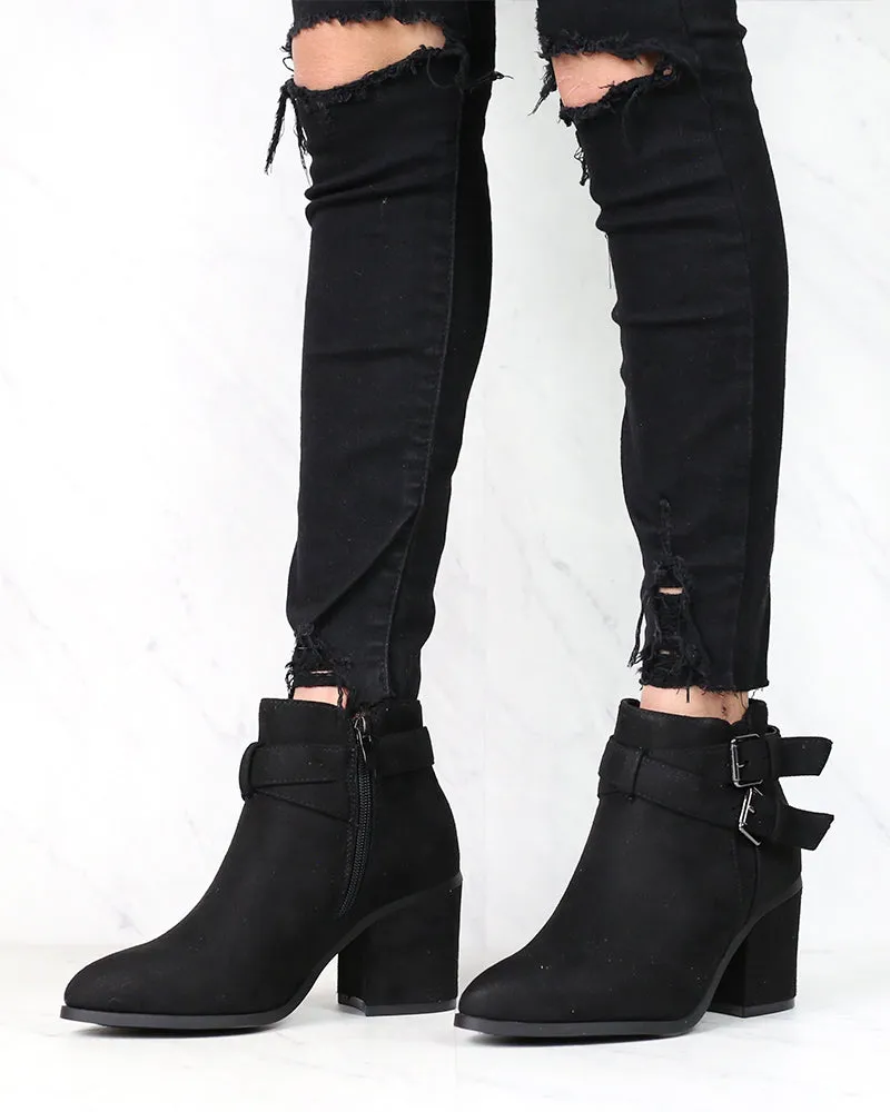 A Grand Entrance Faux Suede Ankle Bootie With Buckle Detail in More Colors